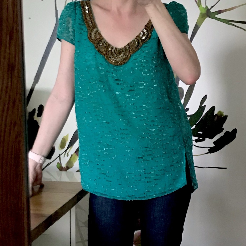 Beaded neckline blouse from Anthropologie.